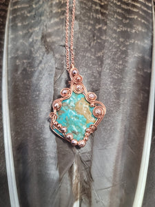 Turquoise wrapped in copper
